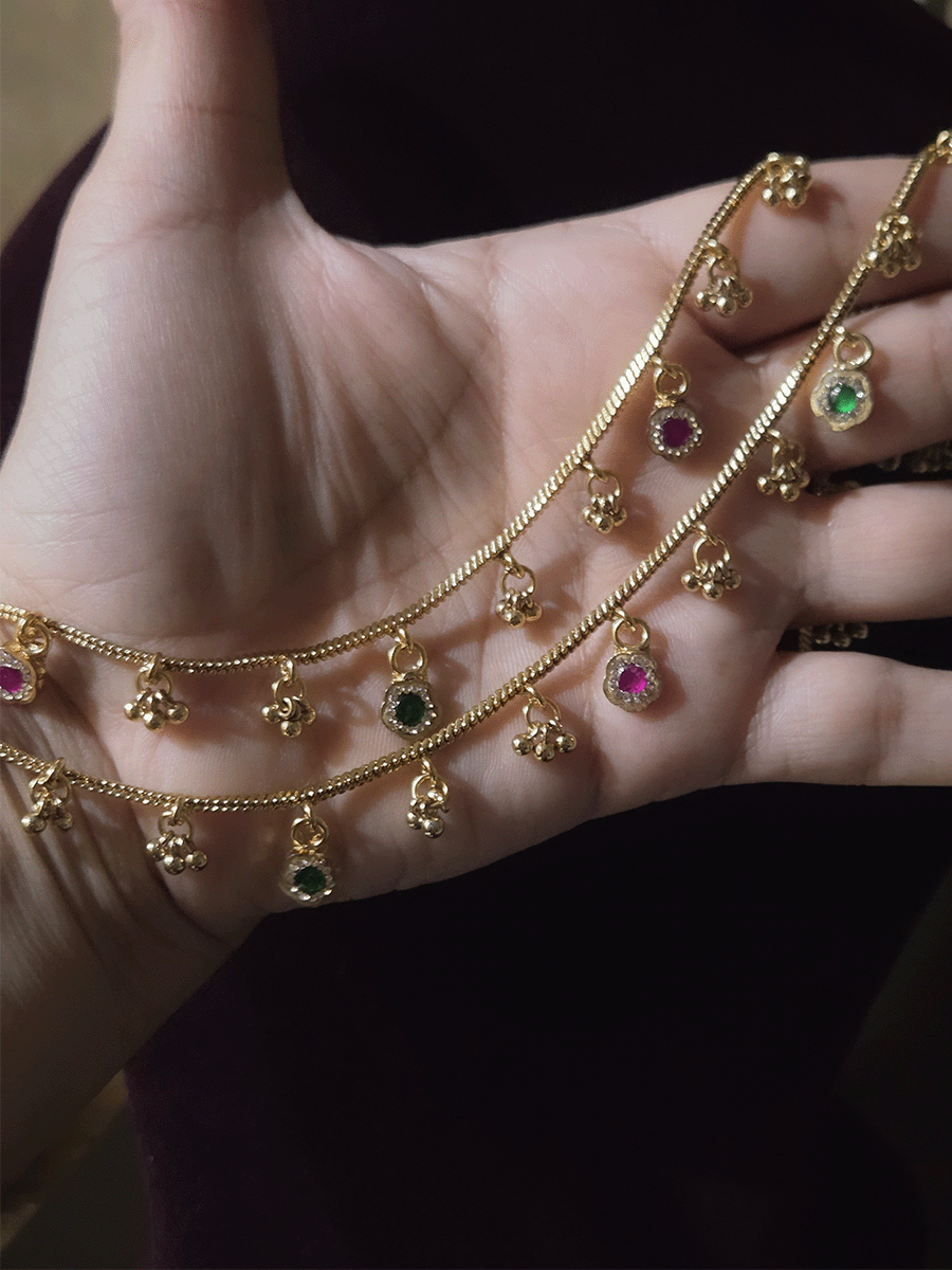Ruby and green flower tukdies and ghunghru hangings in chain anklets