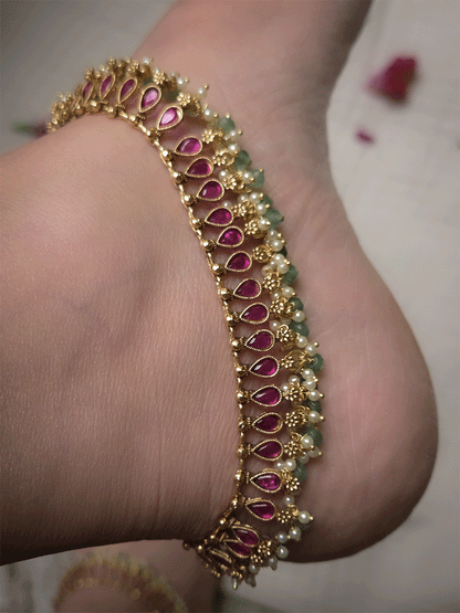 Tear shaped stones studded classy anklets with pearl and gold bead hangings