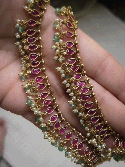Tear shaped stones studded classy anklets with pearl and gold bead hangings