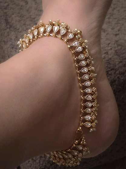 Tear shaped stones studded classy anklets with pearl and gold bead hangings