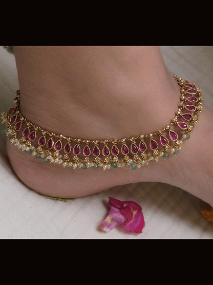 Tear shaped stones studded classy anklets with pearl and gold bead hangings
