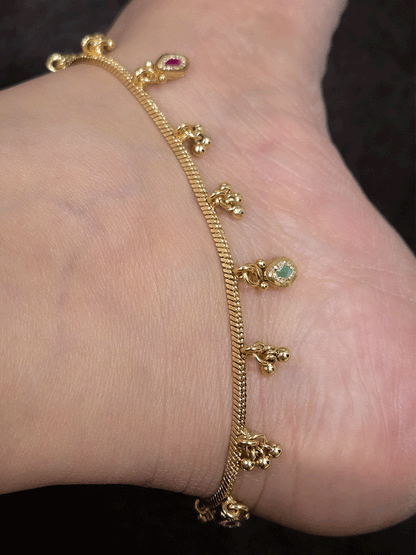 Chain anklets with leaf shaped coloured stones hanging tukdies and ghunghru hangings