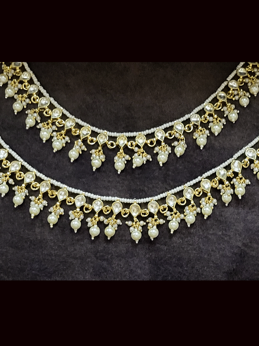 Pacchi kundan pearl drop anklets with leaf shaped design