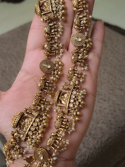 Traditional kundan doli and elephant design anklets with pearl and gold bead hangings