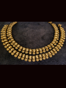 Circular tukdies attached to leaf top self design anklets