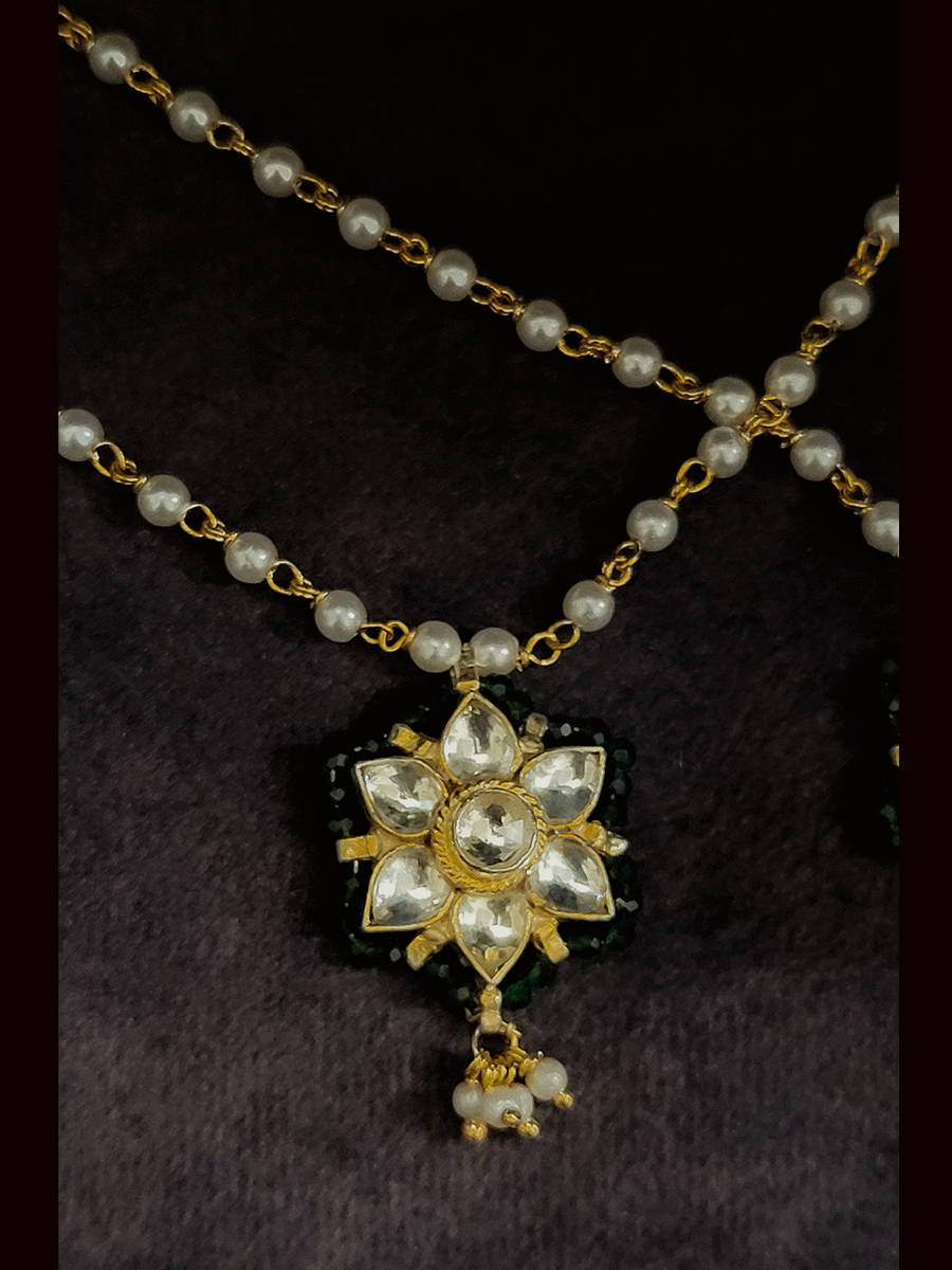 Paachi kundan flower with green pirohi anklets in pearl chain