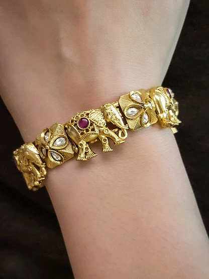Set of two openable elephant with ruby stone and kundan flower design kadas