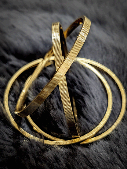 Set of four self lines design gold finish bangles(Non-openable)
