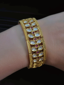 Leaf shaped uncut polki with ruby stones center adjustable kada(1.5cm broad)