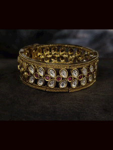 Leaf shaped uncut polki with ruby stones center adjustable kada(1.5cm broad)