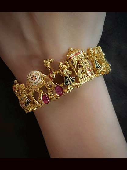 Set of two openable ruby stones and green enamel camel and doli engraved kada's