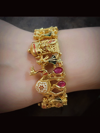 Set of two openable ruby stones and green enamel camel and doli engraved kada's