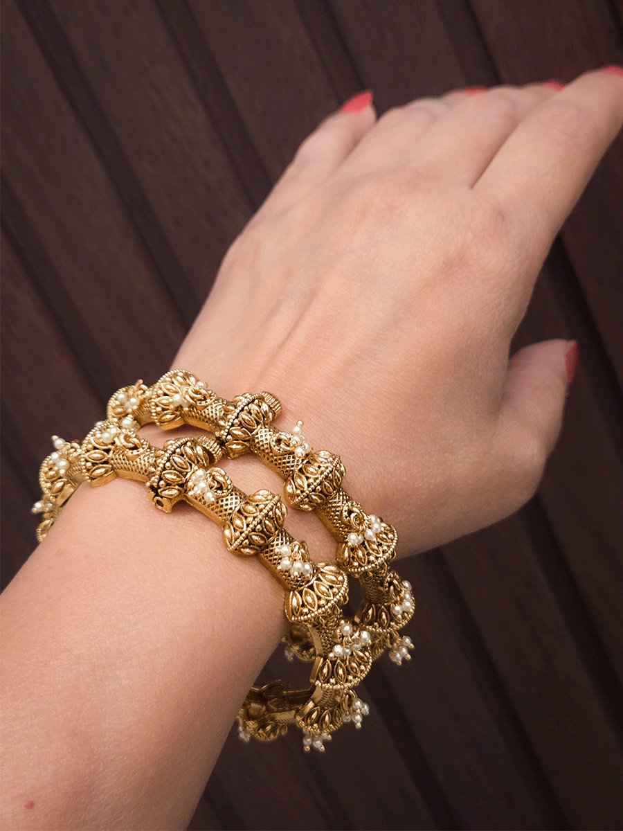 Pearly hangings in between half gold bead with leaf design openable kadas(set of two)