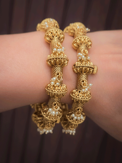 Pearly hangings in between half gold bead with leaf design openable kadas(set of two)