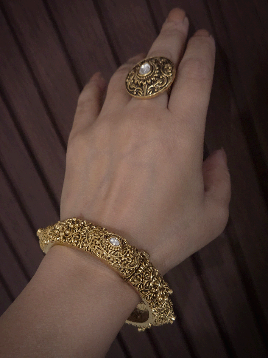 Set of two self paisley design kundan and ghunghru hangings openable kada's