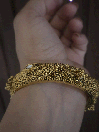 Set of two self paisley design kundan and ghunghru hangings openable kada's