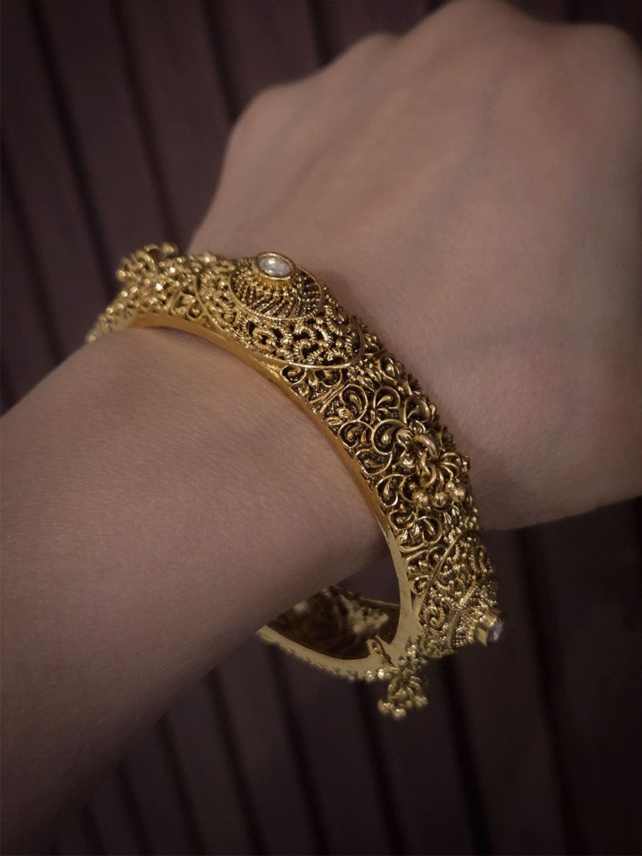 Set of two self paisley design kundan and ghunghru hangings openable kada's