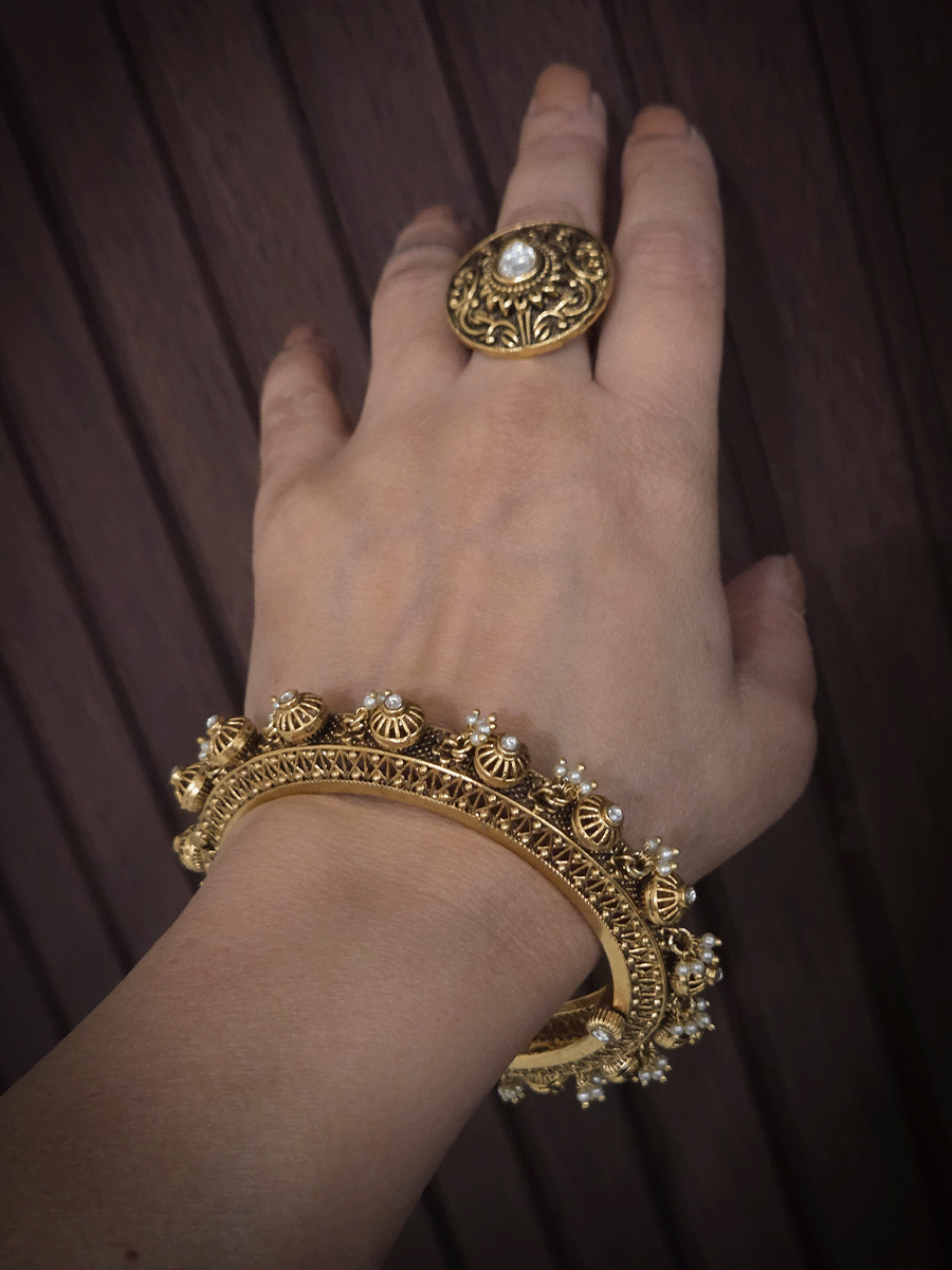 Kundan studded in wheel design set of two openable kada's with pearly hangings