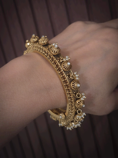 Kundan studded in wheel design set of two openable kada's with pearly hangings