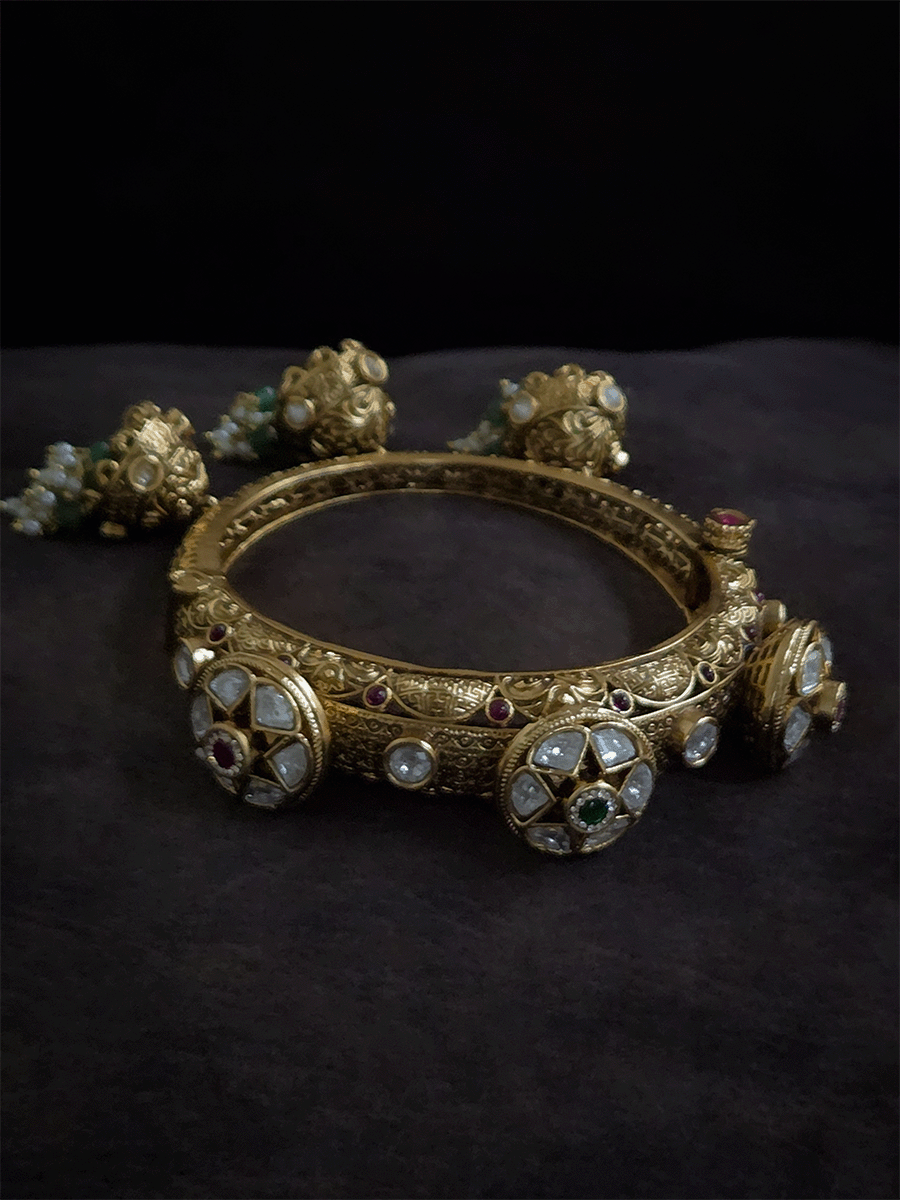 Three kundan flower pacheli style intricate design three hanging jhoomkies with aqua beads single openable kada