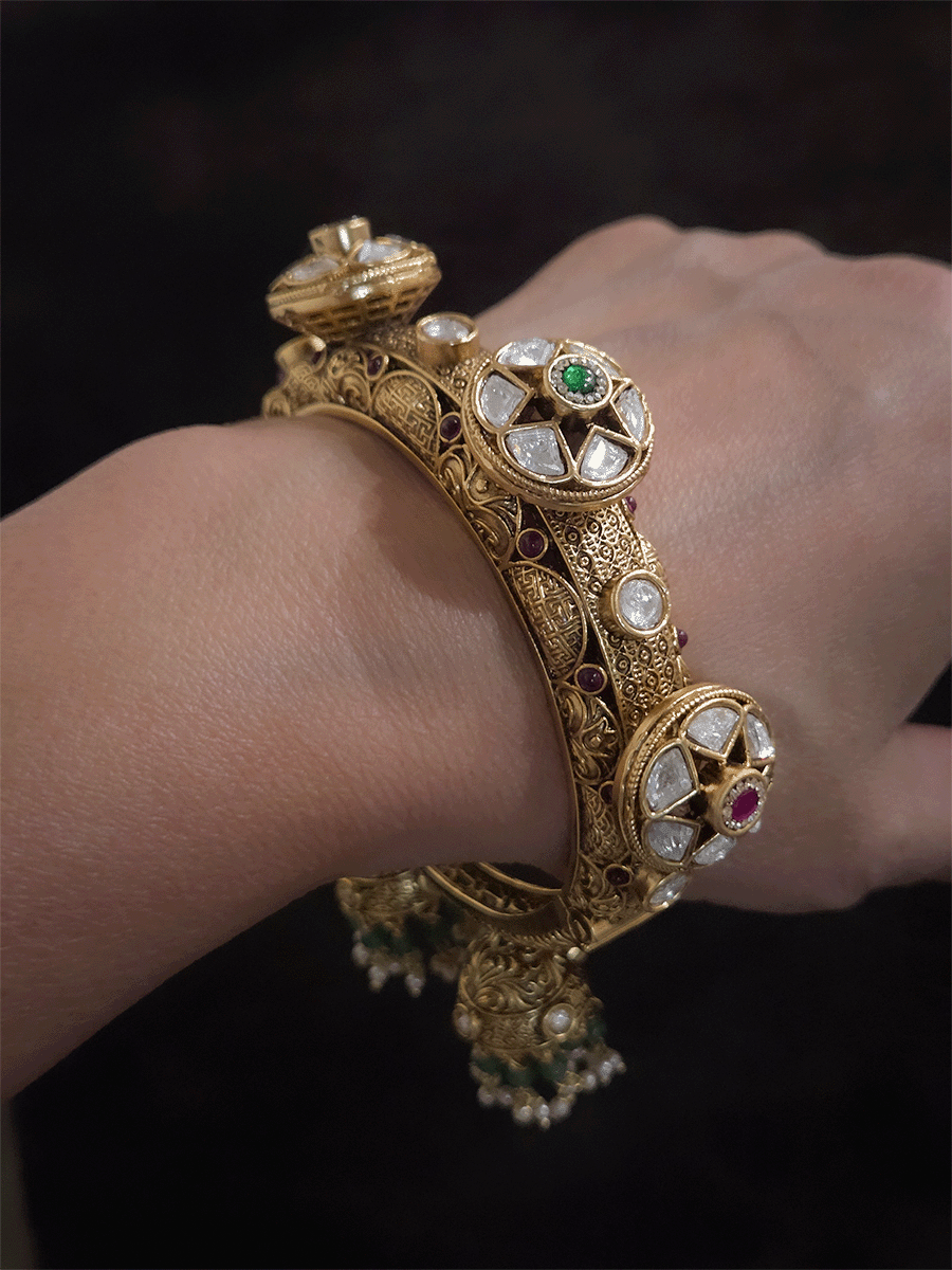 Three kundan flower pacheli style intricate design three hanging jhoomkies with aqua beads single openable kada