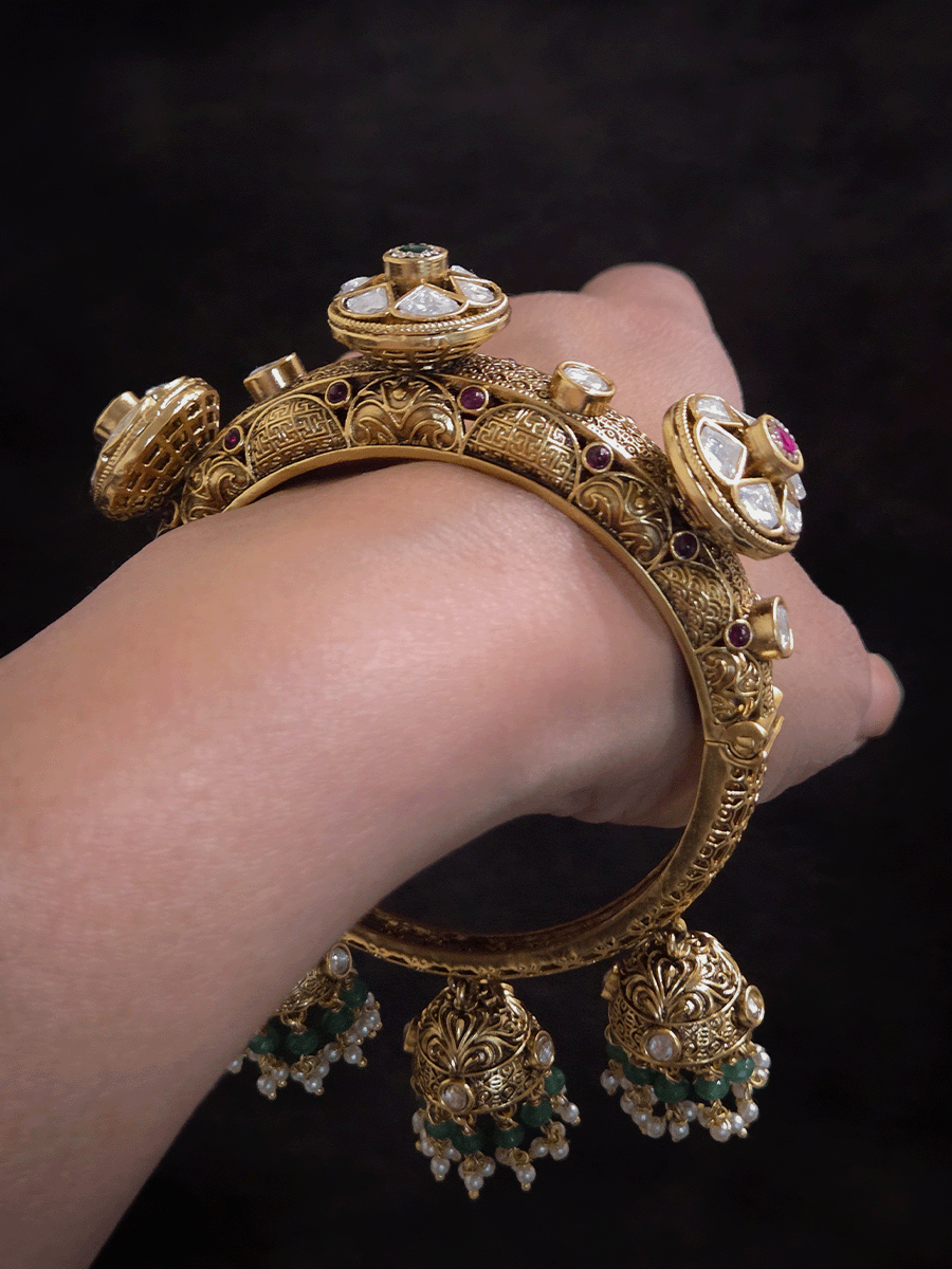Three kundan flower pacheli style intricate design three hanging jhoomkies with aqua beads single openable kada