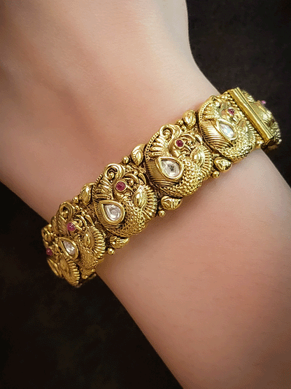 Set of two openable peacok design kadas with kundan and ruby stones