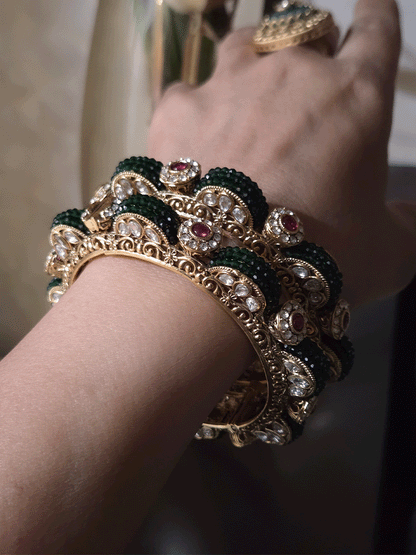 Set of two openable green bead pirohi kadas with kundan detailing on sides