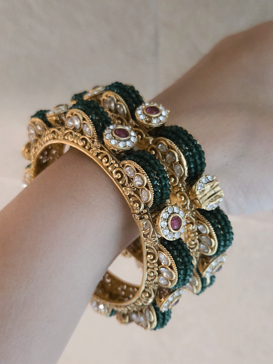 Set of two openable green bead pirohi kadas with kundan detailing on sides