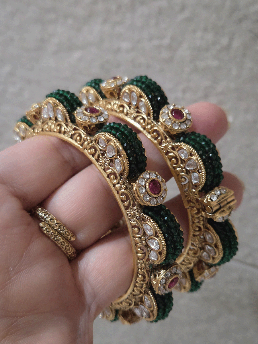 Set of two openable green bead pirohi kadas with kundan detailing on sides