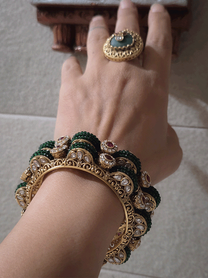 Set of two openable green bead pirohi kadas with kundan detailing on sides
