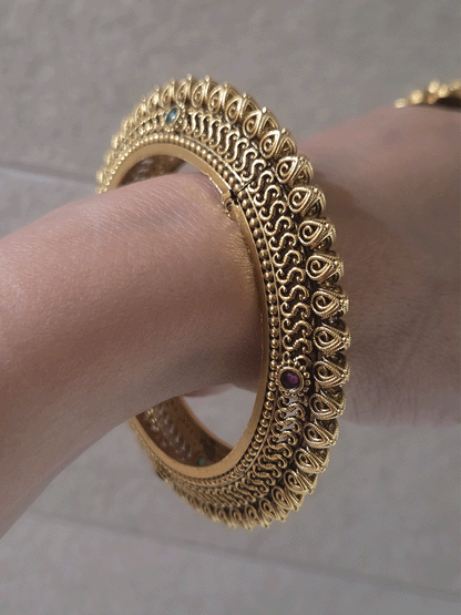 Set of two openable leaf design pacheli kada's with ruby and green stones