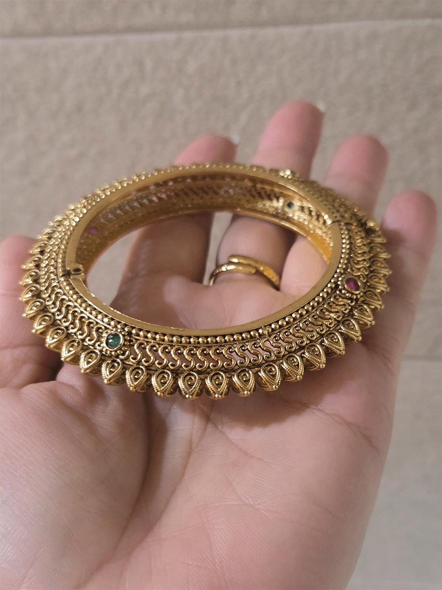 Set of two openable leaf design pacheli kada's with ruby and green stones