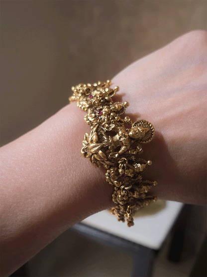 Set of two laxmiji openable kada's with ruby stones and ghunghru hangings