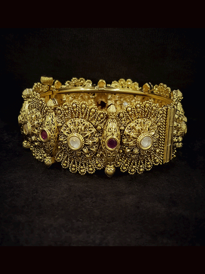 Set of two kundan and ruby stone studded openable flower design kada's
