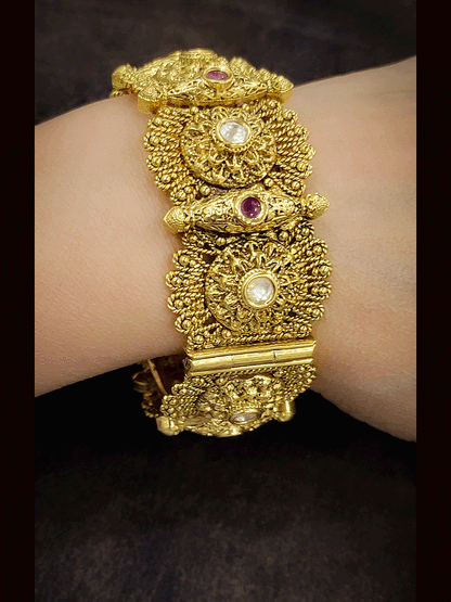 Set of two kundan and ruby stone studded openable flower design kada's