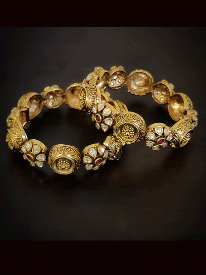 Set of two openable antique gold finish kundan flower design and circular self design kadas
