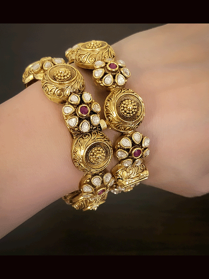 Set of two openable antique gold finish kundan flower design and circular self design kadas