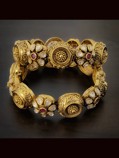 Set of two openable antique gold finish kundan flower design and circular self design kadas