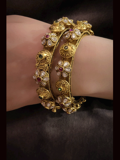 Set of two openable antique gold kundan and ruby green stones pacheli's