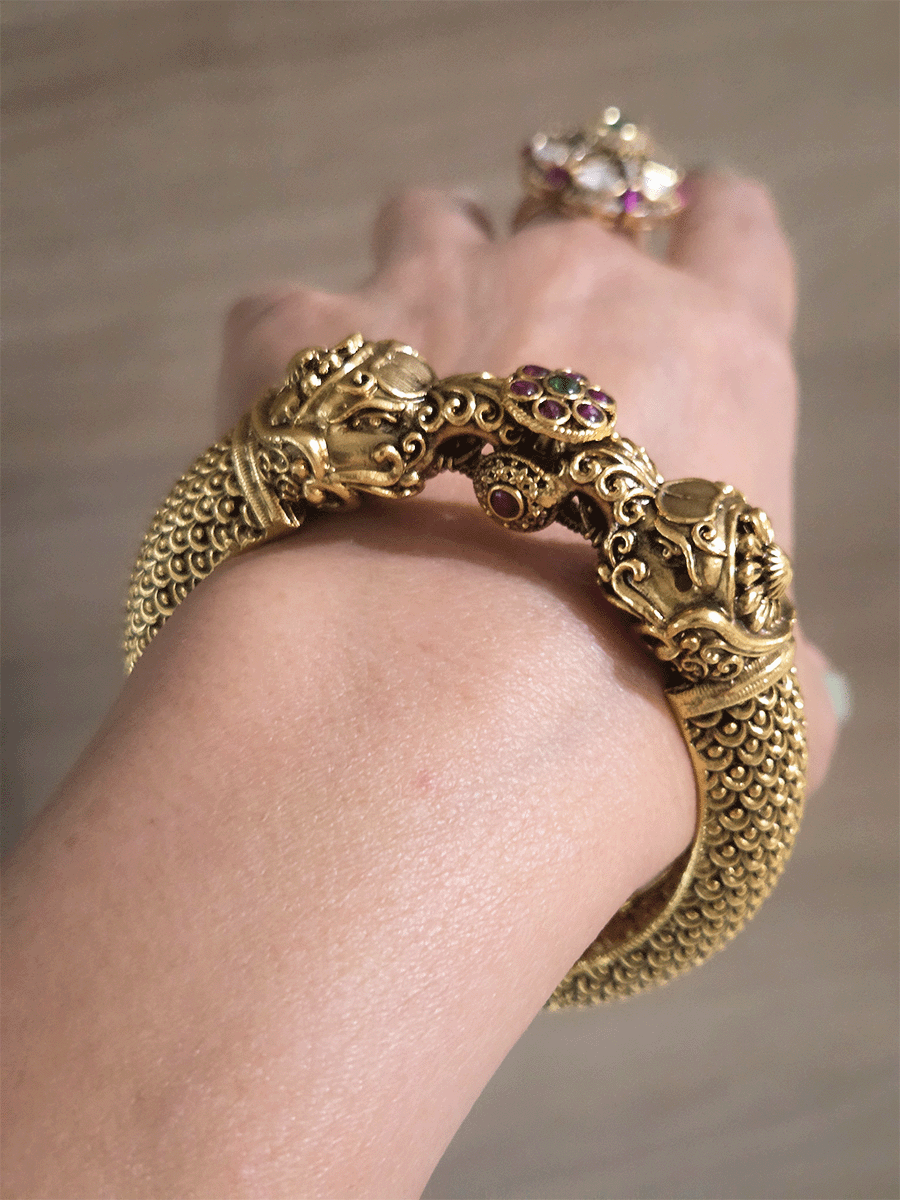 Single elephant mouth openable kada with ruby green stones flower screw in center