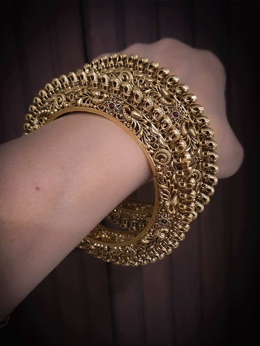 Set of two intricate peacock side carving pacheli style openable kadas