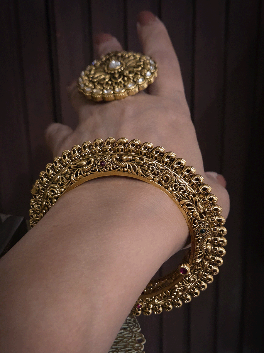 Set of two intricate peacock side carving pacheli style openable kadas