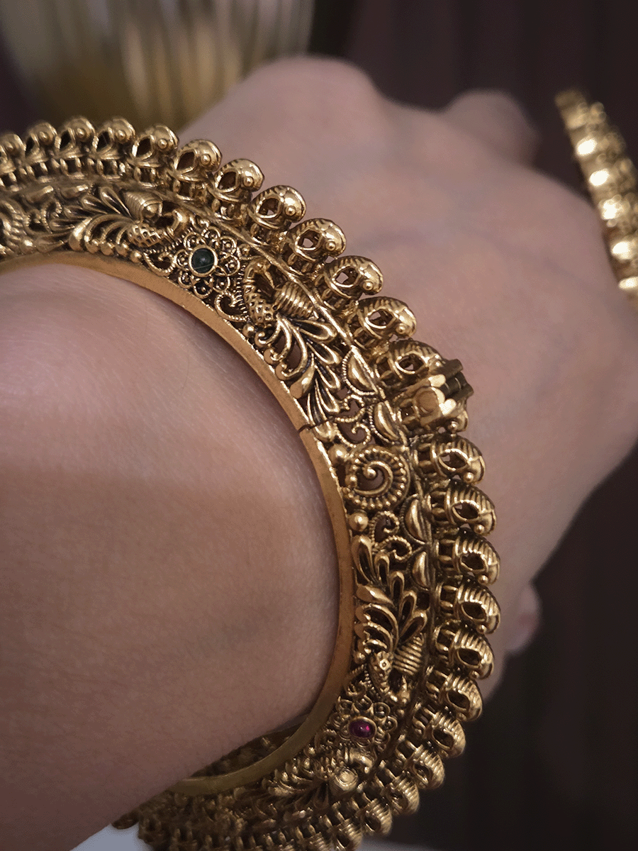 Set of two intricate peacock side carving pacheli style openable kadas