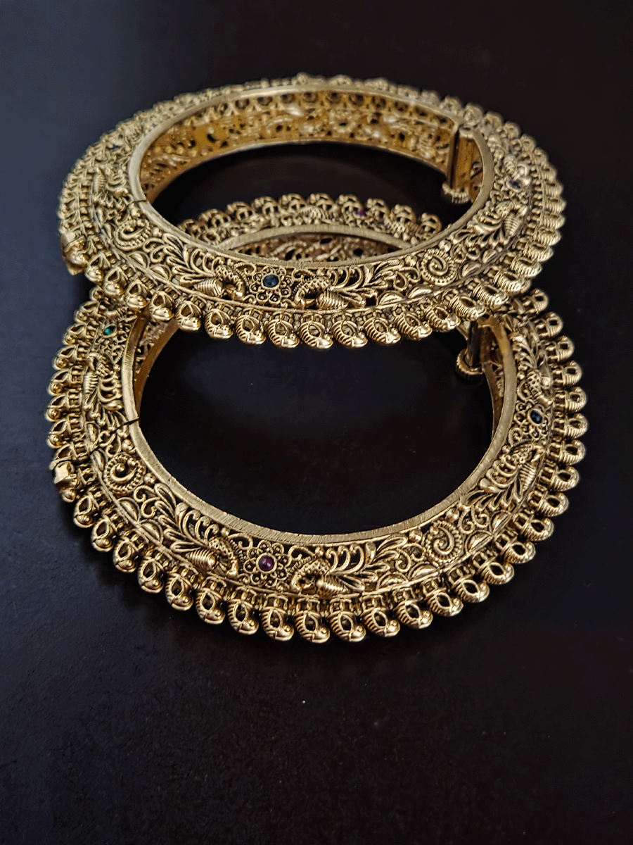 Set of two intricate peacock side carving pacheli style openable kadas