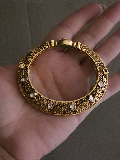 Aqua stone center with ruby leaf design oval shaped single openable kundan kada