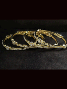 Set of four single line AD circular design bangles(non-openable)