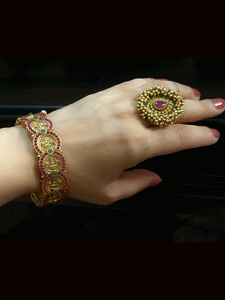 Set of two ruby and green stones studded laxmiji coin design openable kadas