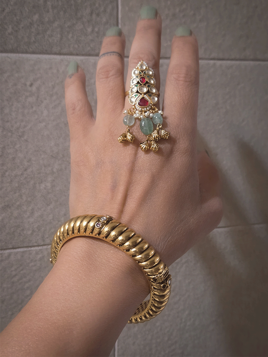 Single openable gold plated traditional design kada with kundan and ruby stones