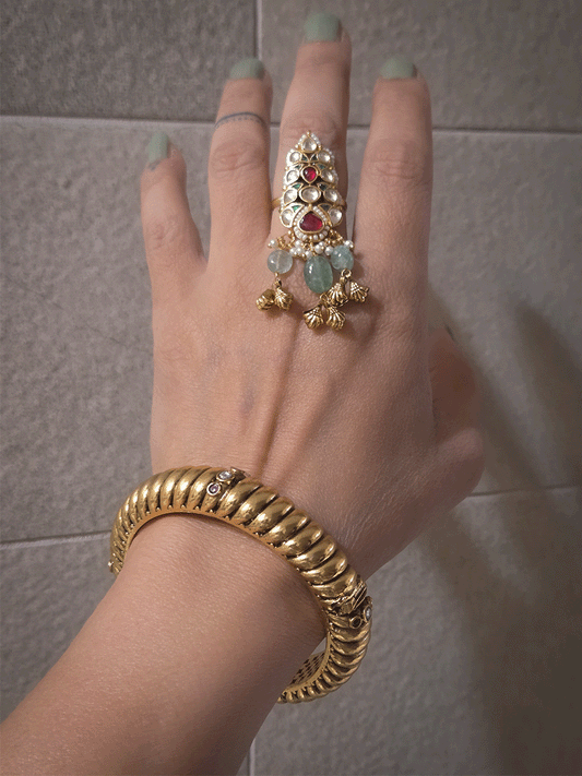 Single openable gold plated traditional design kada with kundan and ruby stones